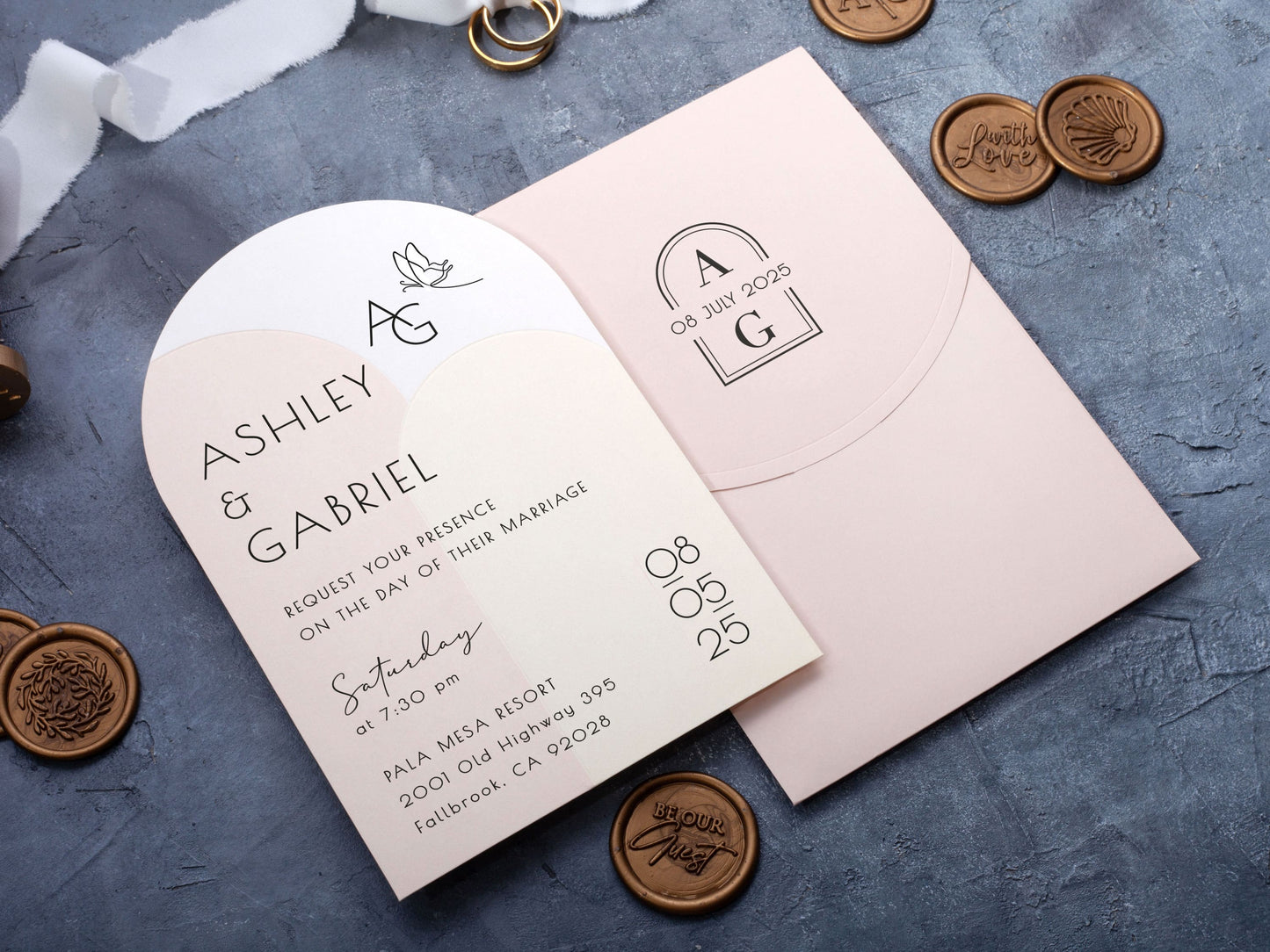 Minimal Arch Wedding Invite Paired with a Soft Pink Envelope