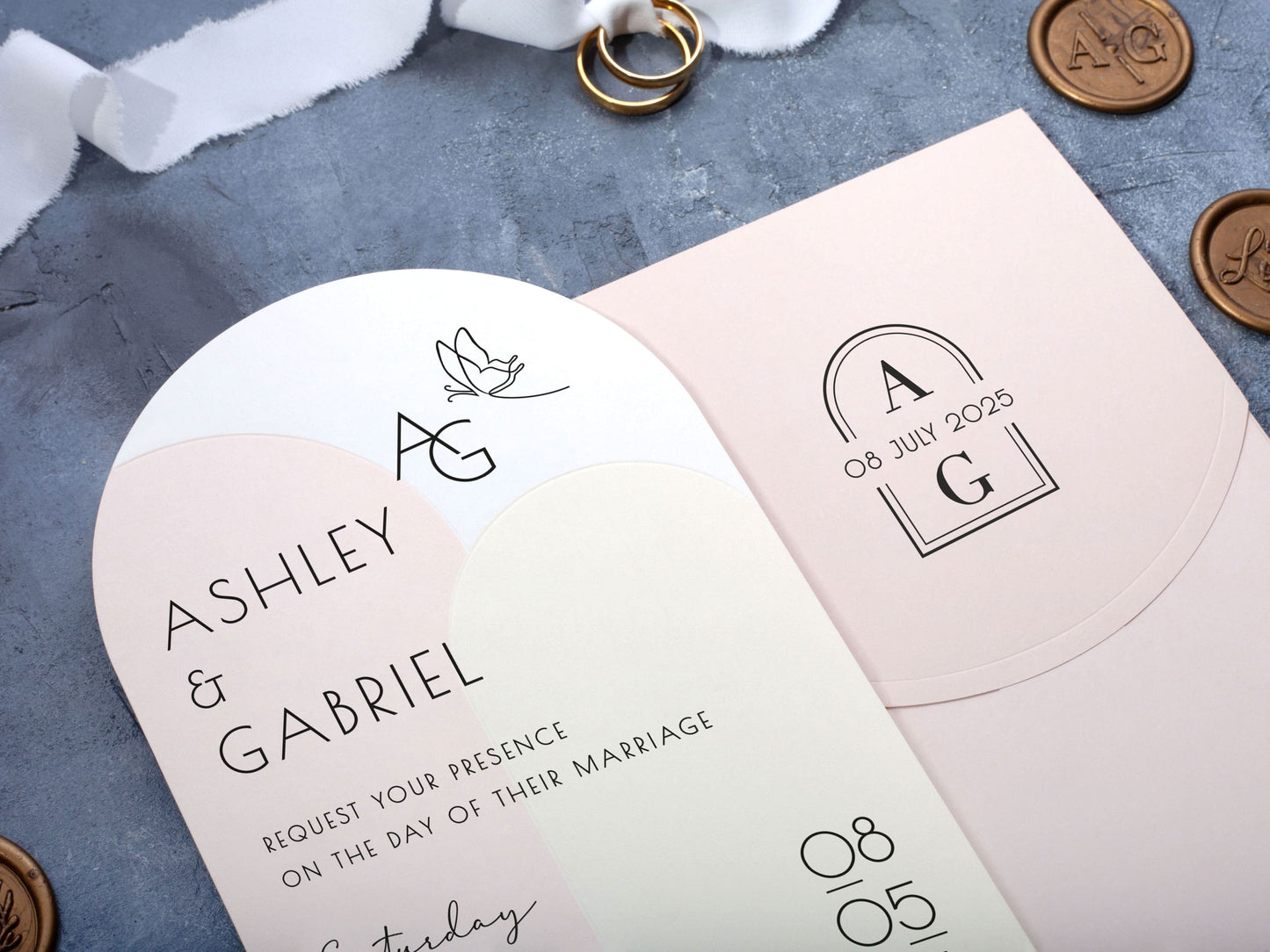 Minimal Arch Wedding Invite Paired with a Soft Pink Envelope