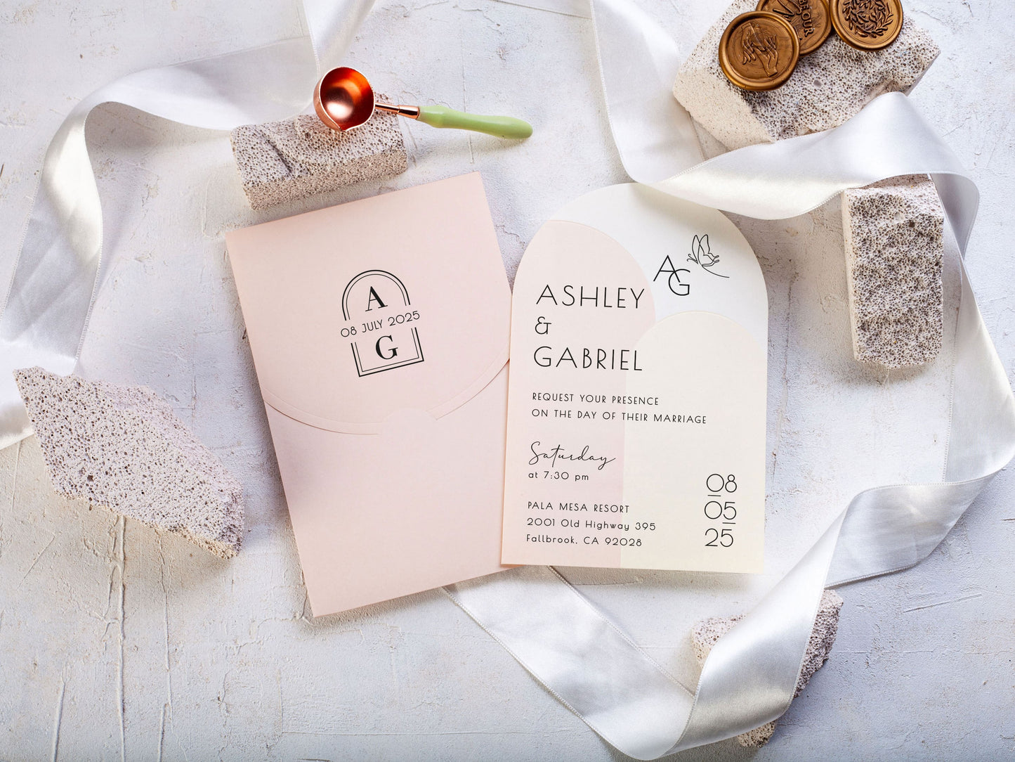 Minimal Arch Wedding Invite Paired with a Soft Pink Envelope